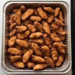 Catering-size chicken strips prepared by Poboys Kitchen in San Francisco