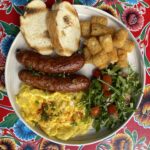 Grilled chicken apple sausage and eggs served for breakfast at Poboys Kitchen in San Francisco