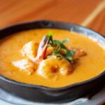 Cajun shrimp served with garlic bread at Poboys Kitchen in San Francisco