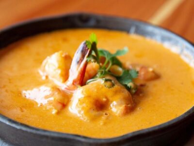 Cajun shrimp served with garlic bread at Poboys Kitchen in San Francisco