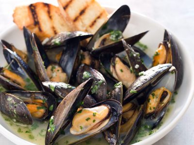 Mussels in white wine lemon garlic sauce served at Poboys Kitchen in San Francisco