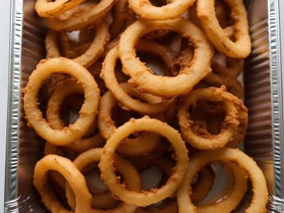 Catering-size onion rings prepared by Poboys Kitchen in San Francisco